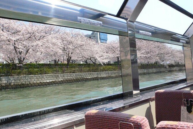 1 Day Takoyaki Making and Osaka Castle Walking Tour - Aqua Liner on the Ogawa River: views from water level