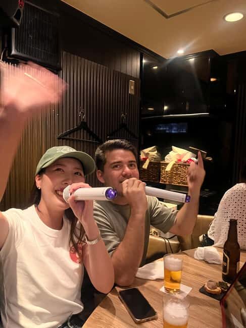 3.5h Osaka Night guided Local Bar Hopping, Sake & Karaoke - Hozenji Temple: a short lesson in traditional praying