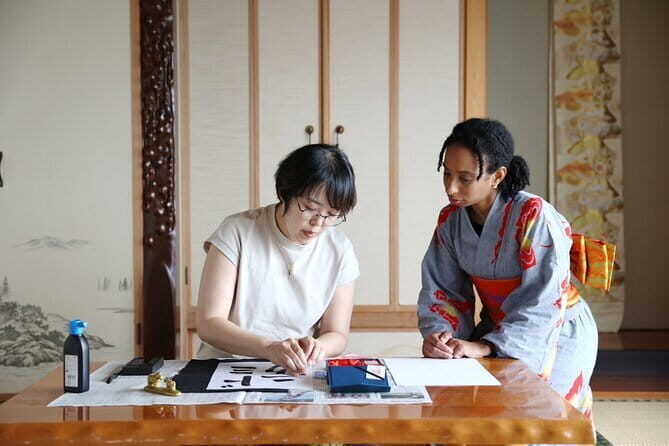 Calligraph Name in Japanese and Dress in Kimono - The calligraphy lesson: posture, brush grip, and the first strokes