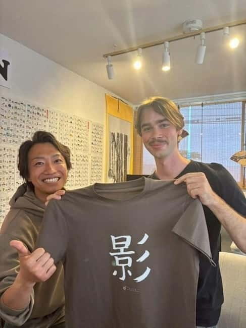 Calligraphy & print your calligraphy on a T-shirt. - Postcard + Green Tea: A Calm Second Souvenir