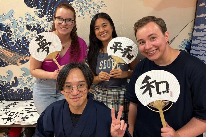 Calligraphy Workshop at Traditional Folk Craft Shop in Hiroshima - Writing on an uchiwa fan or shikishi board