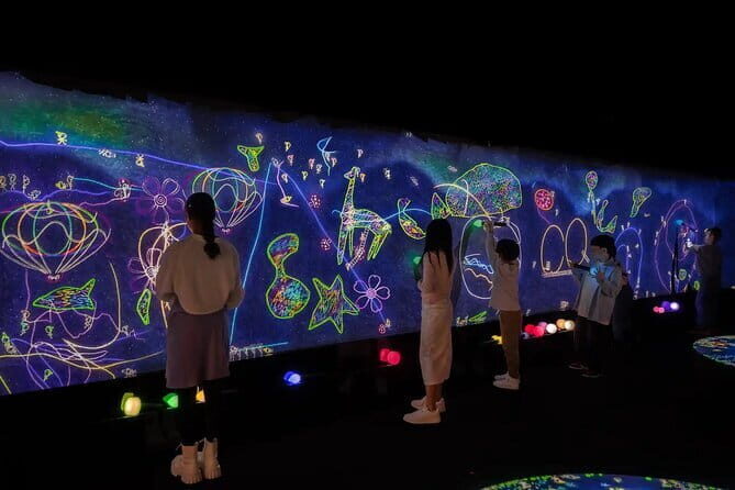 Experience TeamLab Planets in Tokyo - Water Area: koi-like light shows you control with your steps