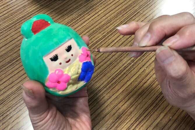 Fukuoka Open Top Bus and Hakata Doll Painting Experience with Guide - Riding the Roofless Bus on the Coastal Expressway