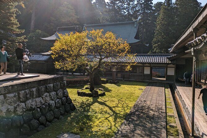 Full Day Tour Eiheiji Buddhist Temple and Fukui City Castle Town - Fukui Castle Ruins: Moat, Walls, and Modern Buildings Inside the Old Footprint