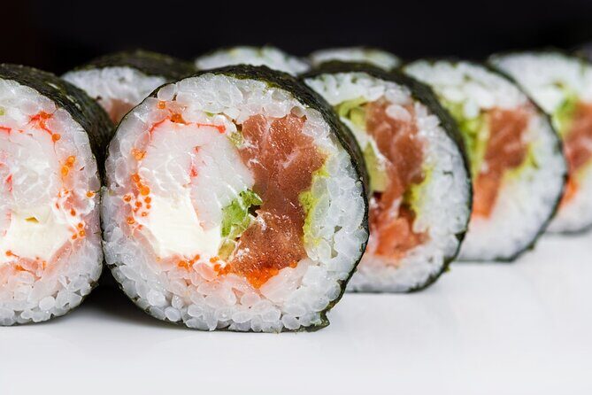 Giant Sushi Cooking Class: Make a 1.5m Sushi Roll in Tokyo - Rolling technique: pressure, shape, and cutting the log