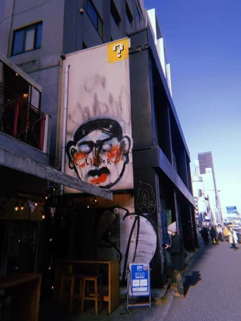 Graffiti in Tokyo Walking Tour: Shibuya and Harajuku - Meeting at Manhattan Records and stepping into Shibuya’s real street map