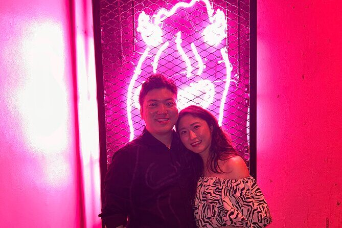 Hidden Gems and Bustling Districts of Osaka Night Tour - Stop 3: Super Pink for Bigger Lights and Big Songs