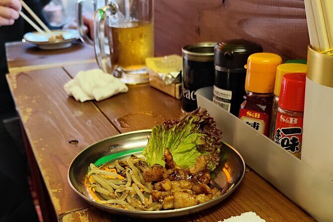 Hidden Osaka Foodie Tour: Nishinari Backstreets & Local Dining - Food stops at neighborhood restaurants: why the drink matters