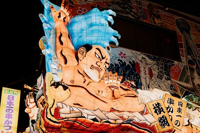 Hidden Osaka - Yukaku Red Light Tour & Culinary Adventure - Shinsekai and Tsutenkaku: eating while walking in Osaka’s old theme park vibe