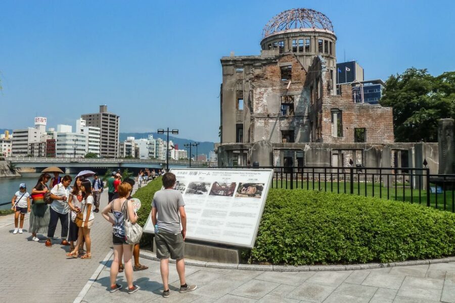 Hiroshima: Hidden Gems and Highlights Private Walking Tour - Stepping off the main route: lively backstreets and secret-feeling alleys