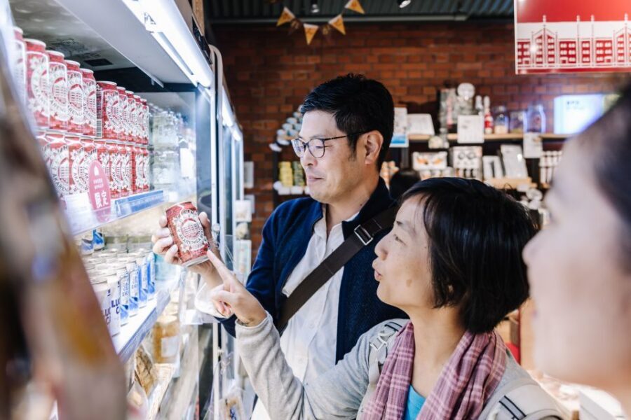 Hiroshima: Private Food Tasting Tour with a Local Guide - Nagarekawa after dark energy: neon streets and quick local stops