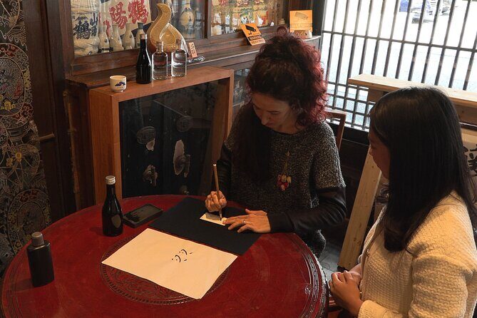 Hiroshima Saijo Sake Tasting Calligraphy and Dinner Private Tour - Stop 2: Kamotsuru museum shop and the brewing process made visual