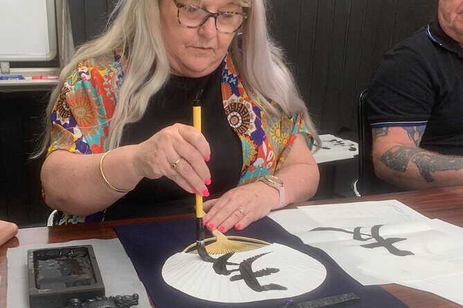 Japanese Calligraphy Class in Yokohama with Tea and Sweets - The brush-work lesson: getting clean strokes without drama