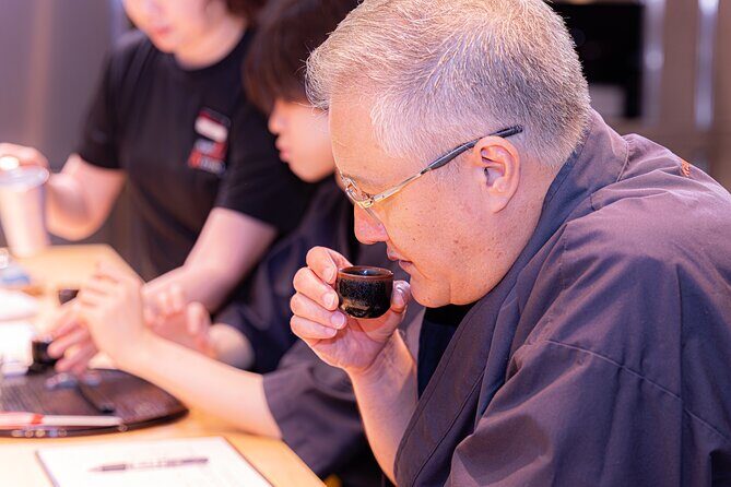 Japanese Sake Tasting & Wagyu Sukiyaki Cooking Class in Tokyo - Getting to Kappodo HQ and settling in at the kitchen studio