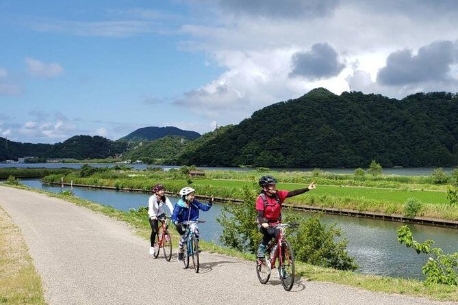 Kinosaki Onsen Cycling Tour Kinosaki & Riverside Experience - Along the river: rice fields, greenery, and a gentler kind of Japan