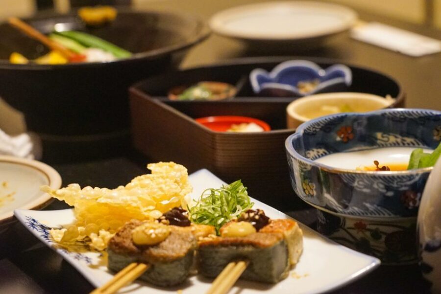 Kyoto: Foodie Night Tour in Gion with 9 dishes + 6 Sake - The shared table + the guide: why conversation is part of the meal