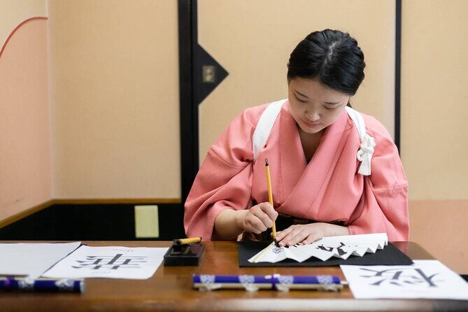 Learning Zen of Japanese Calligraphy in kimono near Osaka Castle - The brushwork lesson: tome, hane, and harai in plain, usable terms