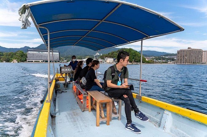 Miyajima Guided Tour and Fresh Oyster Farm Tour - Stop 3: Shimada Suisan cruise—see the Great Torii up close from the sea