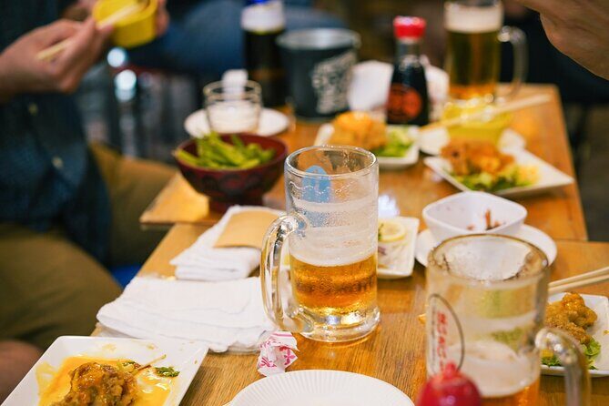 Okinawa Bar Hopping Tour with Sanshin Live in Music Town Koza - Stop 1: Ichibangai Shotengai Toast, Beer, and Local Food You’ll Want to Try