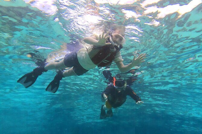 Okinawa: Kayak & Snorkel, Private Tour in Yanbaru - Stop 1: Nakijin-son Kayak Along Cliffs (Reef Line Depends on the Sea)