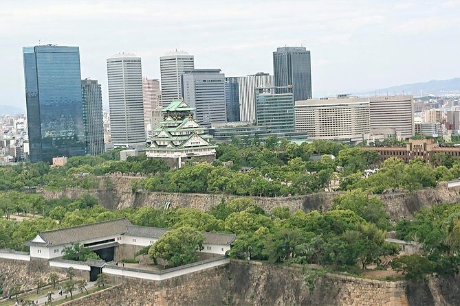 One-Day Walking Tour : Making Fun Memories in North Osaka - Osaka Castle: moats, gold ornament details, and a samurai story thread