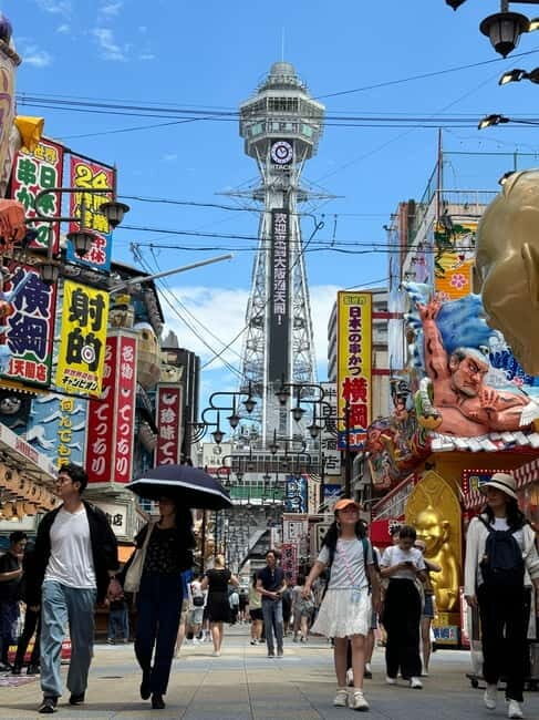 Osaka: 1-Day Guided Tour - Sky Bldg, Castle, Namba Shinsekai - Shinsekai and Tsutenkaku: nostalgia, photos, and a shooting gallery