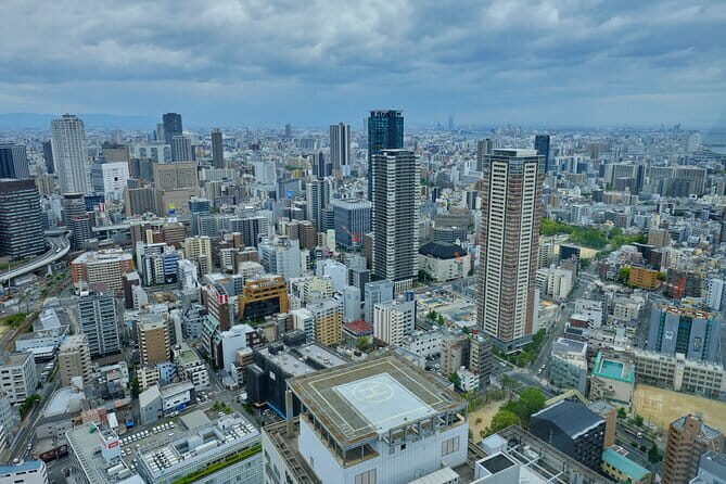 Osaka 6hr Instagram Highlights Private Tour with Licensed Guide - Dotonbori District: entertainment street scenes and easy photo opportunities