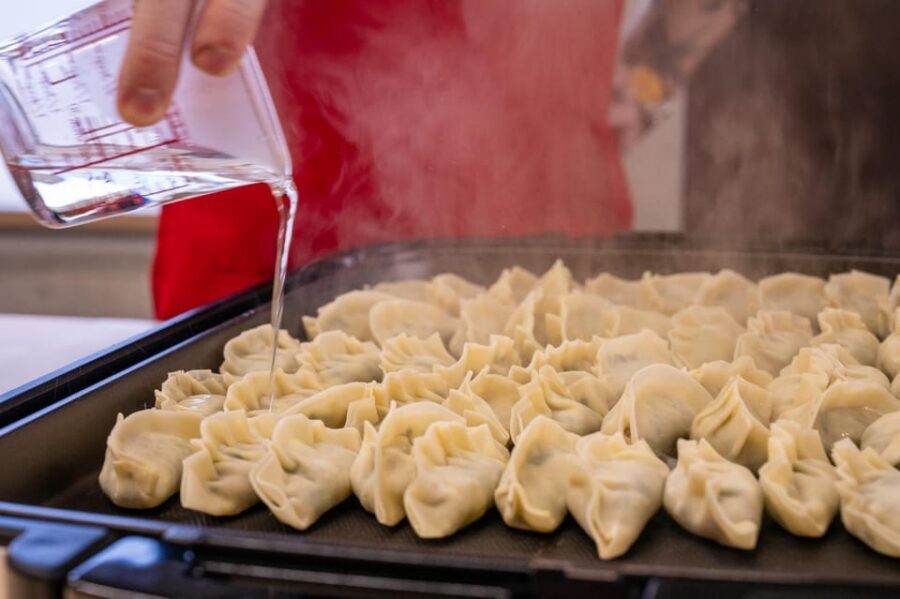 Osaka: Cooking Class & Sake Tasting with Local Market Visit - Sake tasting (plus beer) while you cook: why it works