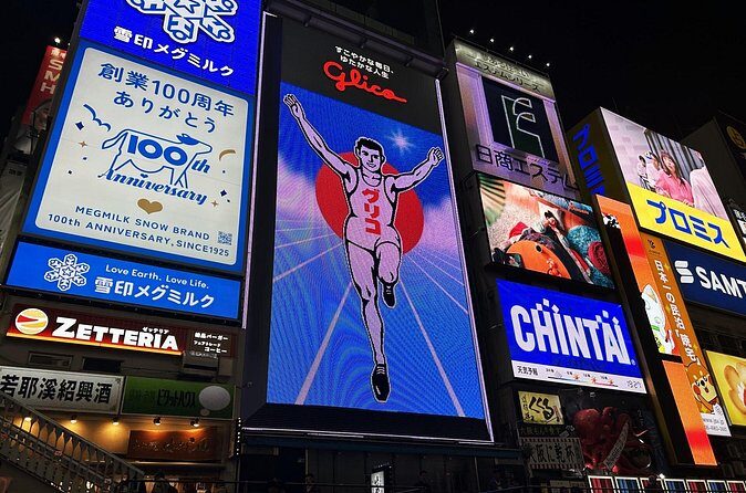 Osaka Deep Night Street Walking Tour - Dotonbori at night: neon food signs and the Japan’s kitchen story