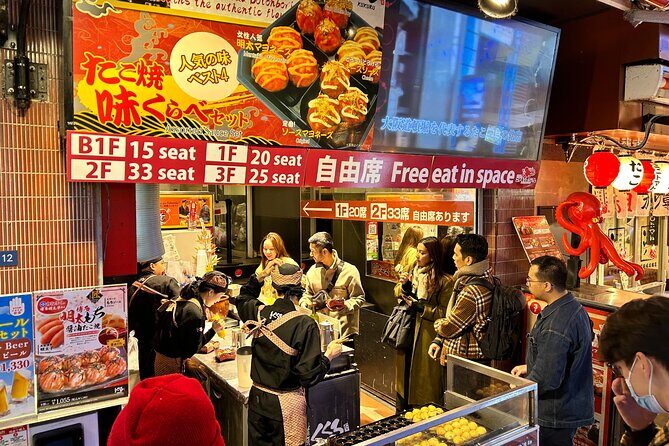 Osaka Delights: Traditional Japanese Food Tour - Kuromon Market and Wanaka takoyaki: where the snack game starts