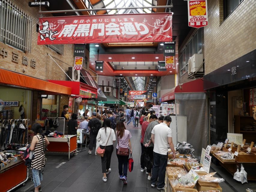 Osaka: Full-Day Sightseeing Tour by Private Vehicle - Shin-sekai: retro Osaka with food, games, and attitude