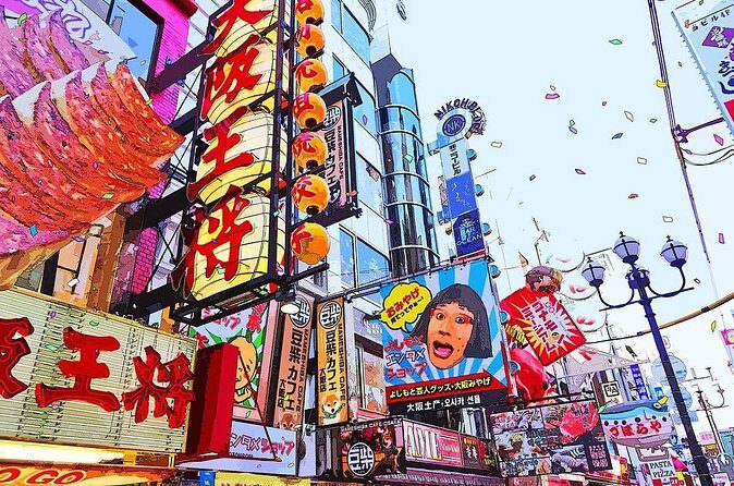 Osaka Full Day Walking Tour with Local Expert Guide - Dotonbori: neon signs, street food, and canal-side energy