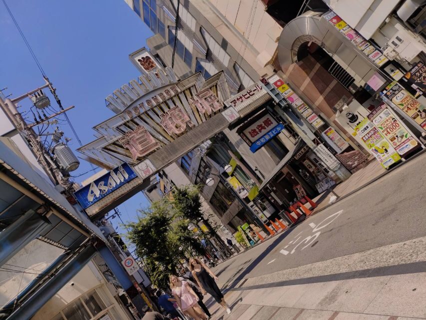 Osaka: Half-day Ultimate Highlights Guided Walking Tour - Hozenji Yokocho: old lanterns, a quiet pause, and temple calm