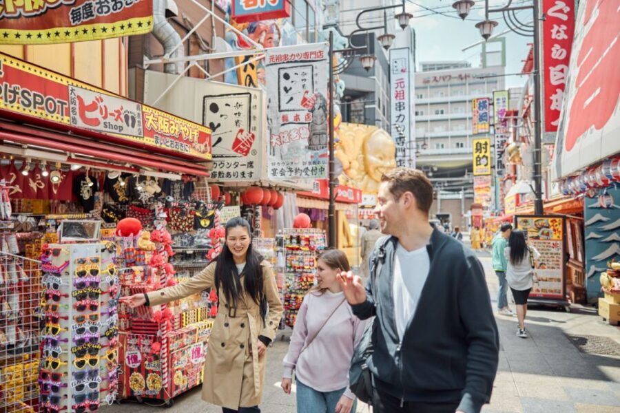 Osaka: Highlights & Hidden Gems Private Walking Tour - Dotonbori to Shinsaibashi: neon signs, big food energy, and America-mura