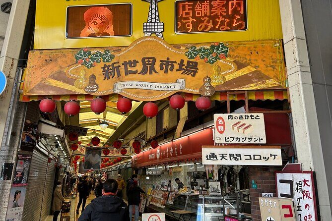 Osaka Highlights Walking Tour: Castle, Dotonbori & Hidden Gems - Kuromon Market: seafood watching, fugu and tuna moments