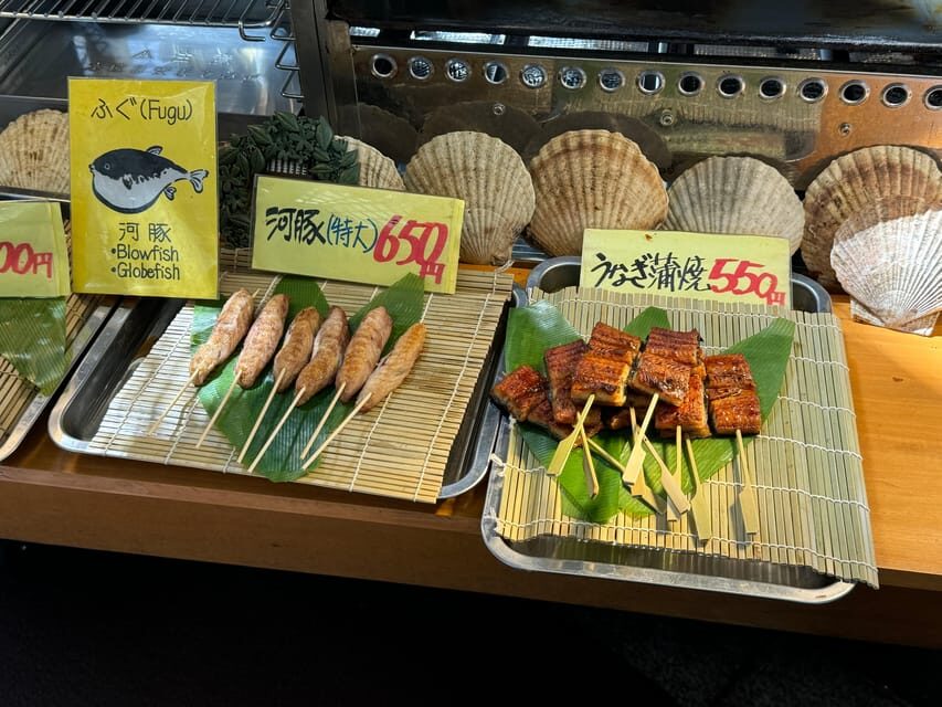 Osaka: Kuromon Market 1.5-Hour Seafood & Street Food Tour - What you’ll eat: sushi, grilled seafood, and Osaka snacks