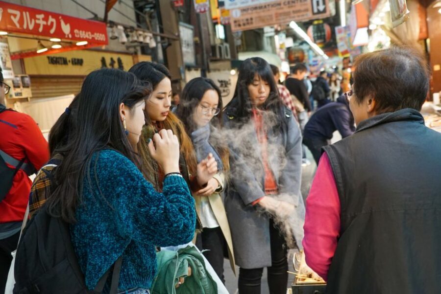 Osaka: Kuromon Market Food Walking Tour (6 stops, 6 tastes) - Where you start at Nipponbashi and how the walk stays usable
