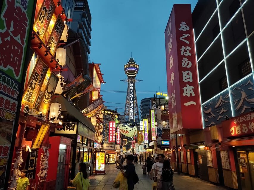 Osaka: LGBTQ+ Tour with Dinner and Drinks - Walking Shin-sekai: the older Osaka “everyone had a life” vibe