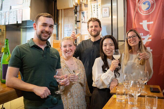 Osaka Local Bar Crawl in Dotombori & Uranamba Area - Meeting at Dotonbori Humanity Song Monument and learning the Glico sign