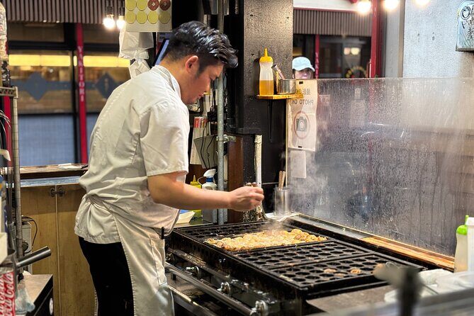 Osaka Night Walk : Discover Umeda Food and Pub - Stop 1: Ohatsu Tenjin Urasando Food Street and its izakaya street energy