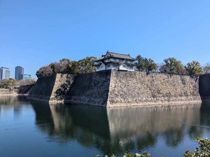 Osaka: Osaka Castle Guided Tour with Local Guide - Walking the Castle Grounds: Stone Walls and Defense Logic