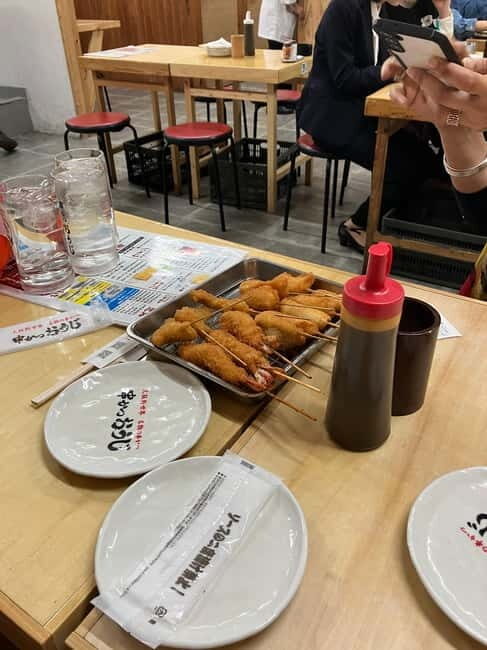 Osaka: Private and Fully Customized Tour with Hotel Meet Up - Dotonbori on foot: neon energy with a story attached