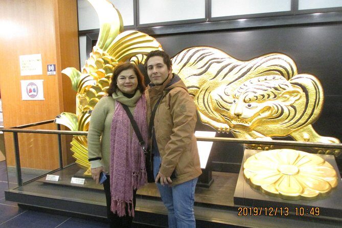 Osaka Private Tour by Public Transportation - Tsutenkaku: the symbolic tower, the crowds, and the famous nickname