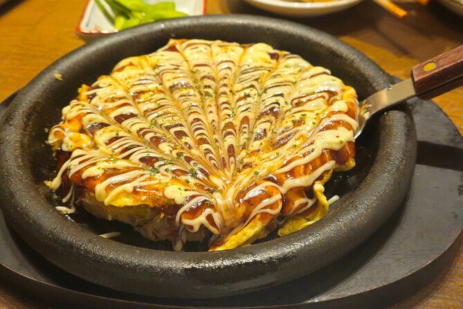 Osaka: Shinsekai Food Tour - 13 Dishes at 5 Local Eateries - Stop 1: Shinsekai Inari Shrine for a calm reset