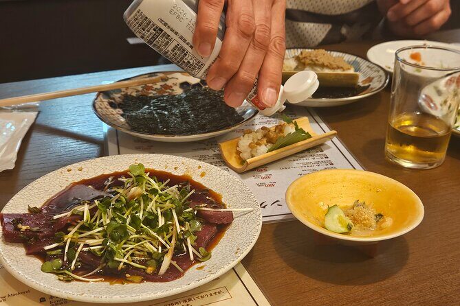 Osaka: Shinsekai Food Tour - 13 Dishes at 5 Local Eateries - Stop 4: Tsutenkaku stop for photos and final context