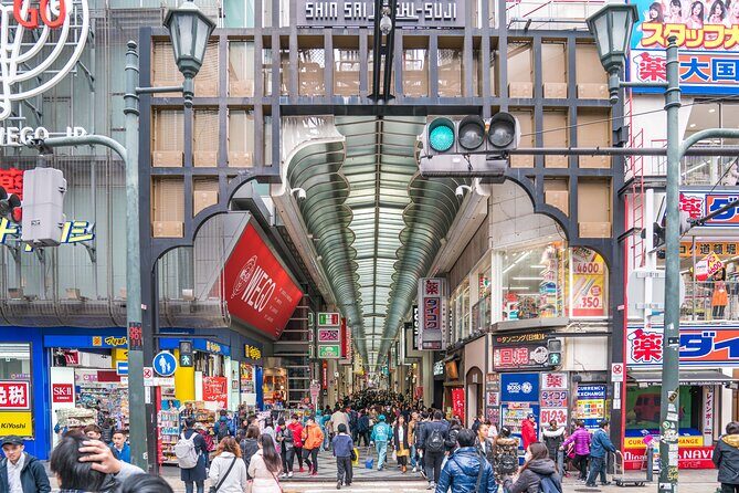 Osaka Unveiled Private Tour: Bustling Streets to Serene Shrines - Osaka Ohsho and the Glico Running Man: billboard energy on purpose