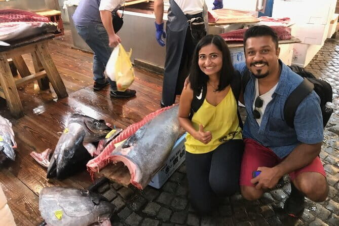 Private Tokyo's Famed Tsukiji Fish Market Tour - Meeting at Eni Kaita Mochi and the morning rhythm