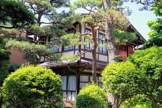 Private Tour Kanazawa, Shirakawago, Hida Furukawa,Takayama - Shirakawago’s thatched roofs and the Sho River pedestrian bridge