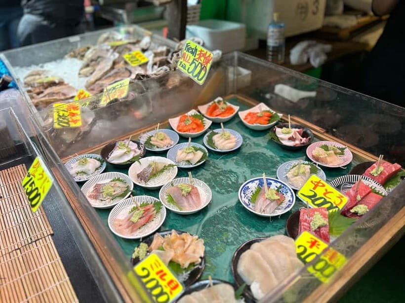 Private Toyosu & Tsukiji Market Adventure with Tuna Auction - Tsukiji Outer Market: where souvenirs turn into meals (and vice versa)