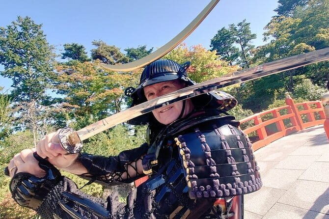Sendai Castle Armor Experience - The ruins view: statue, sword pose, and Sendai cityscape photos